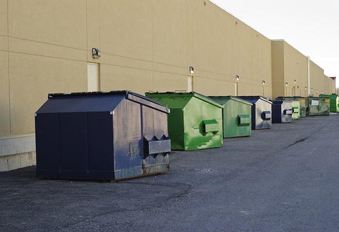 a row of industrial dumpsters at a construction site in Carrier Mills IL